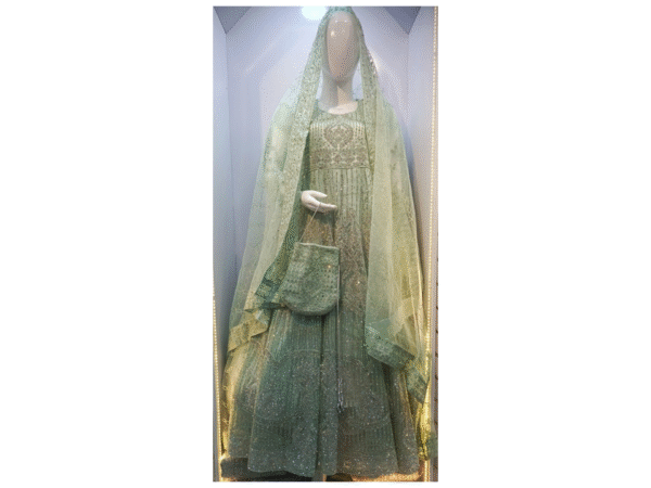 Queen in Emerald Dreams" – A Bridal Ensemble That Speaks Royalty - Image 3